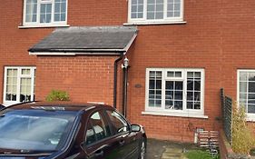 Entire Terraced Two Story Redbrick House With Parking In Secluded Cul De Sac